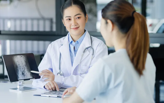 Healthcare consultants discussing a hospital strategy